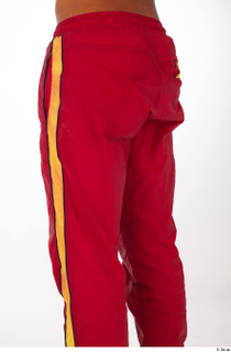 Nabil dressed red athletic track pants sports thigh 0004.jpg